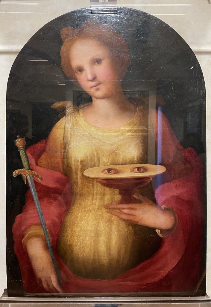 Den hellige Lucia, af Domenico di Pace Beccafumi, oliemaleri på træpanel, 1521, Siena, Palazzo Salimbeni, Collezione del Monte dei Paschi di Siena, Museo di San Donato.